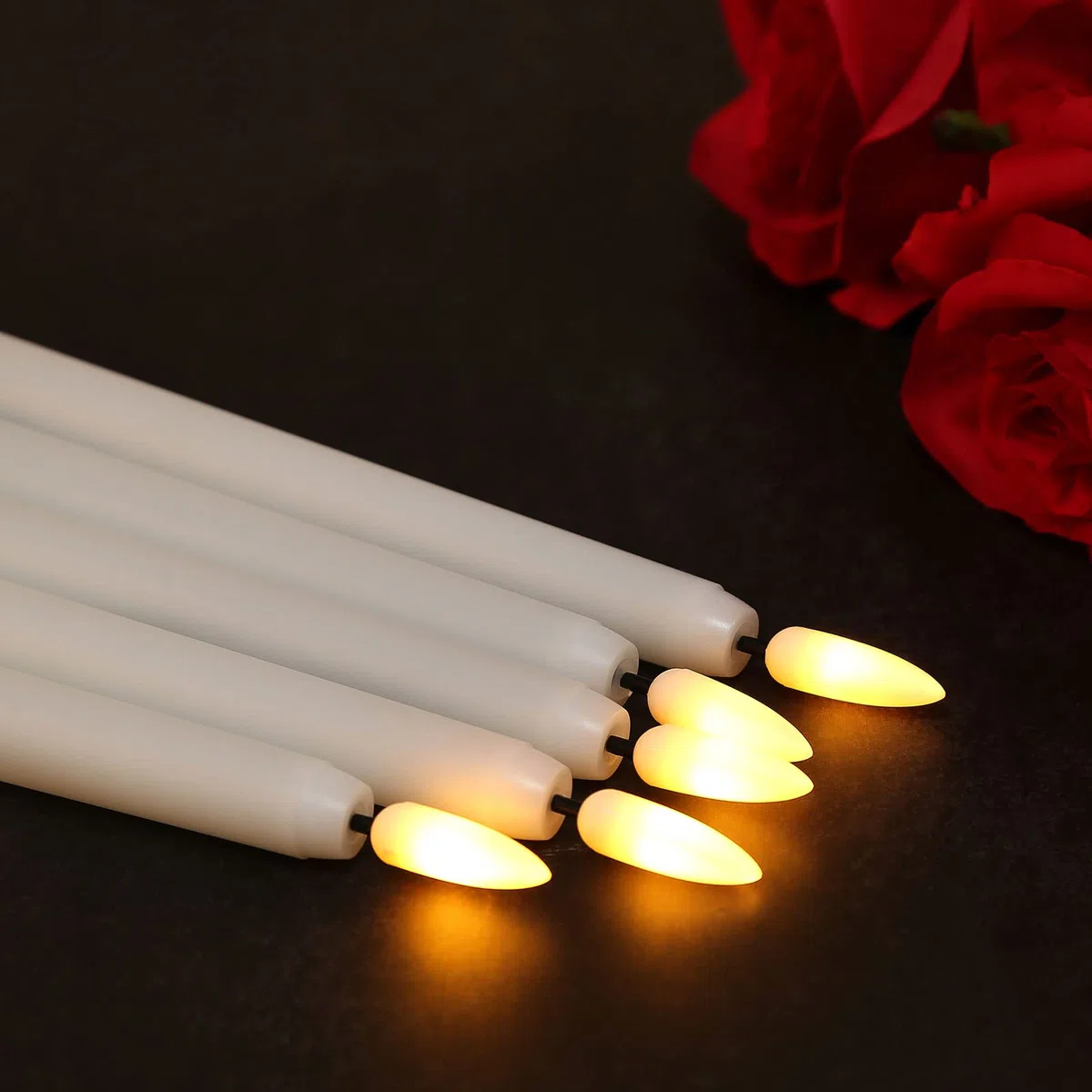 IMAGE Candele a LED senza fiamma, funzionamento a batteria, confezione da 12 candele affusolate color avorio con telecomando e timer, luce tremolante realistica per matrimoni, Natale, San Valentino